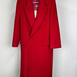 GRLFRND wool long coat with peak lapels and a button closure